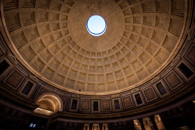 The Eye — Sunlight beams through the Pantheon’s oculus, down upon a throng of tourists.