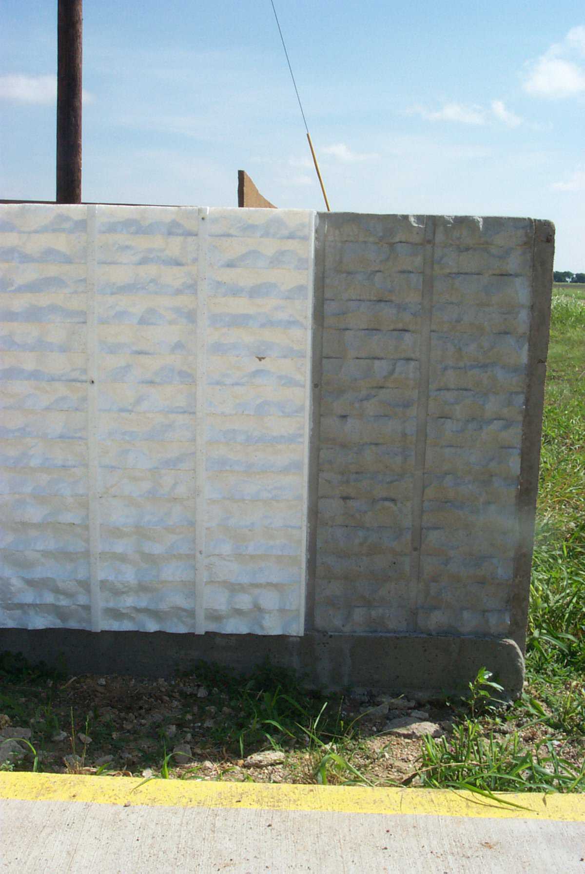Colored concrete — The form liner for the split face brick is a negative of the finished fence. It is easily removed from the cured concrete and can be used over again – generally 10 times. Colored concrete can be used to provide a base color to the fence