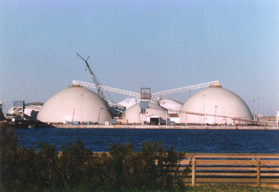 Fertilizer Storages — The PCS Phosphate complex in Morehead City, North Carolina includes two 172′ × 85′ and one 132′ × 51′ domes. In 1996 Hurricane Bertha ravaged Morehead City, but did not succeed in damaging the Monolithic Domes.