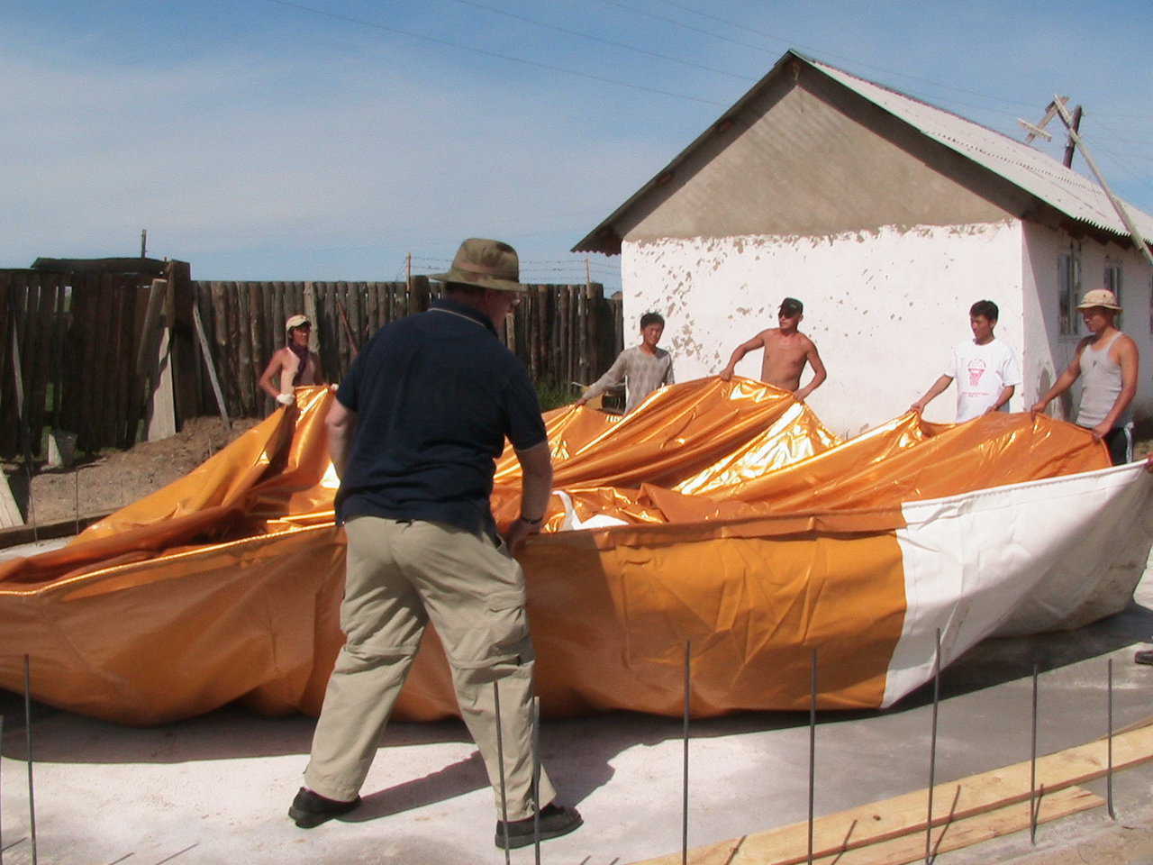Spreading — A crew readies the Airform for inflation by spreading it out.