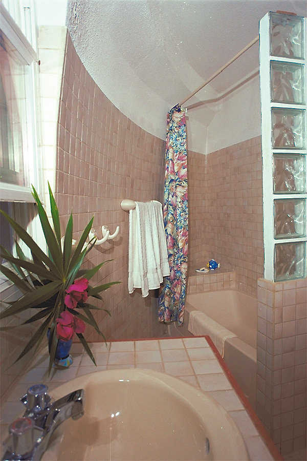 Bathroom — Beautifully tiled bathrooms include both tub and shower.