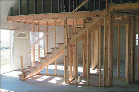 Under Construction — Second floor and staircase during construction stage in the home of Gary Clark in Italy, Texas.