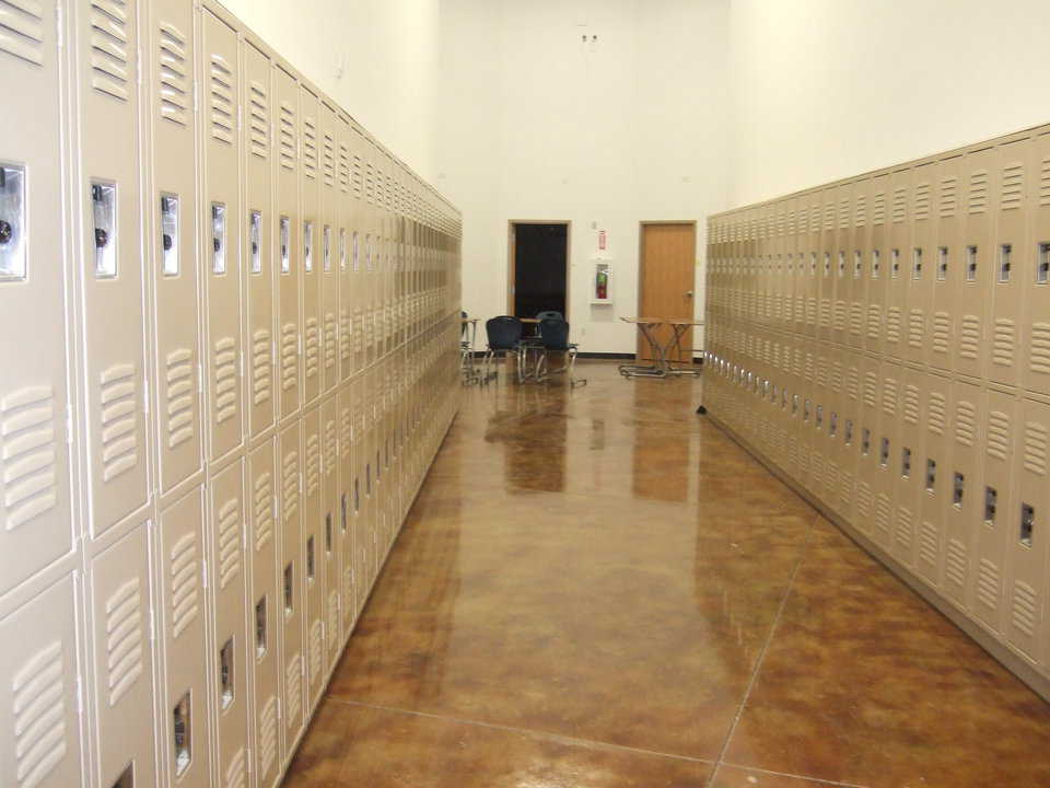 Hallway — It’s lined with double rows of lockers.