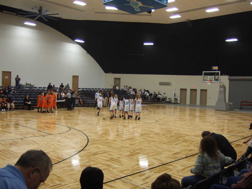 First Basketball Game — Geronimo’s Lady Bluejays won the first basketball game played in the new gym by defeating the Lady Coyotes, 36-31.