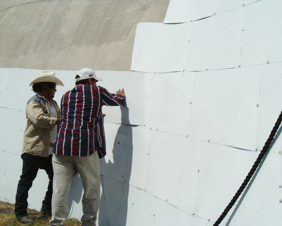 Metal Cladding — Application of metal cladding on Bruco in Italy, Texas. Metal Cladding is metal plates similar to shingles fastened to each other and the dome with mechanical fasteners. Metal cladding is especially useful for the dome built without the Airform or to cover a dome with Airform difficulties.