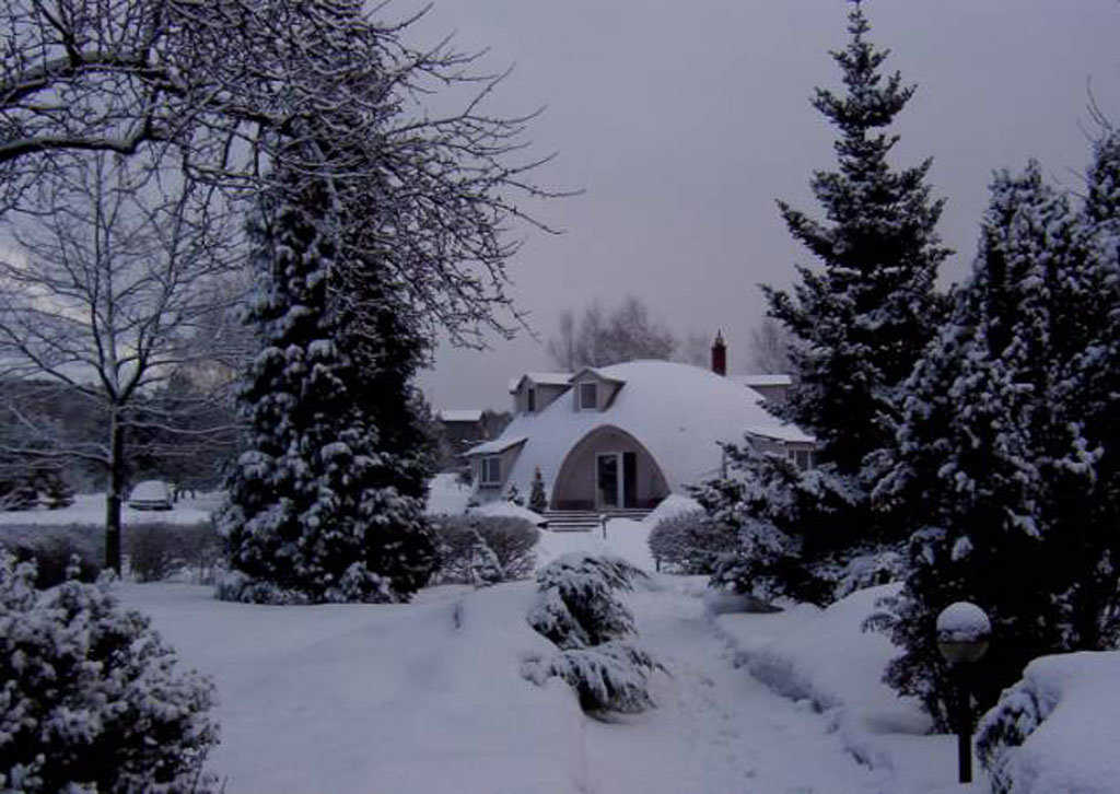 Winter scene — Their Monolithic Dome home keeps the Pregowski family comfortable even in Poland’s very cold winter weather.
