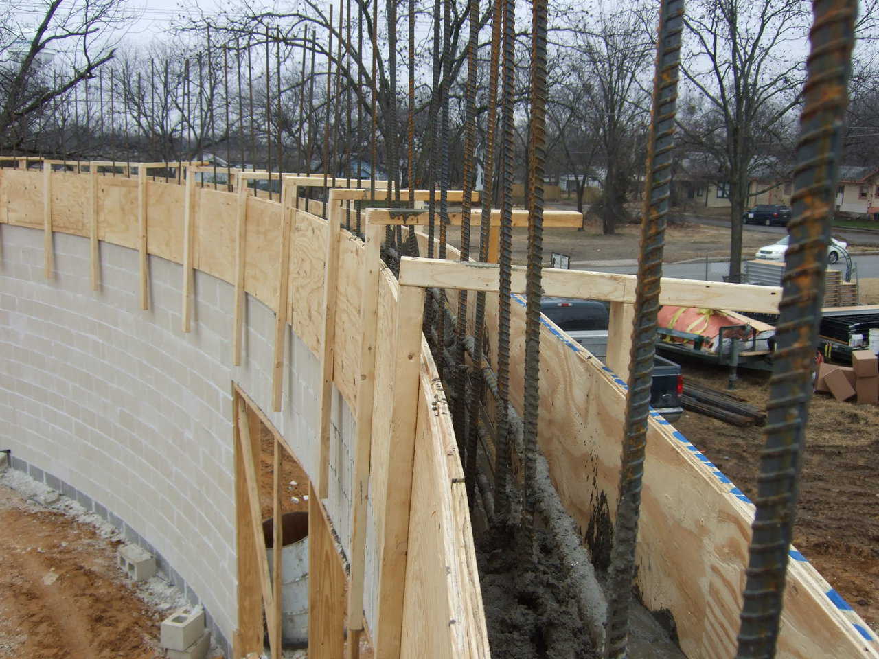 Stemwall Construction — This stemwall is being built of formed reinforced concrete and will become a part of the dome when it’s constructed above it.