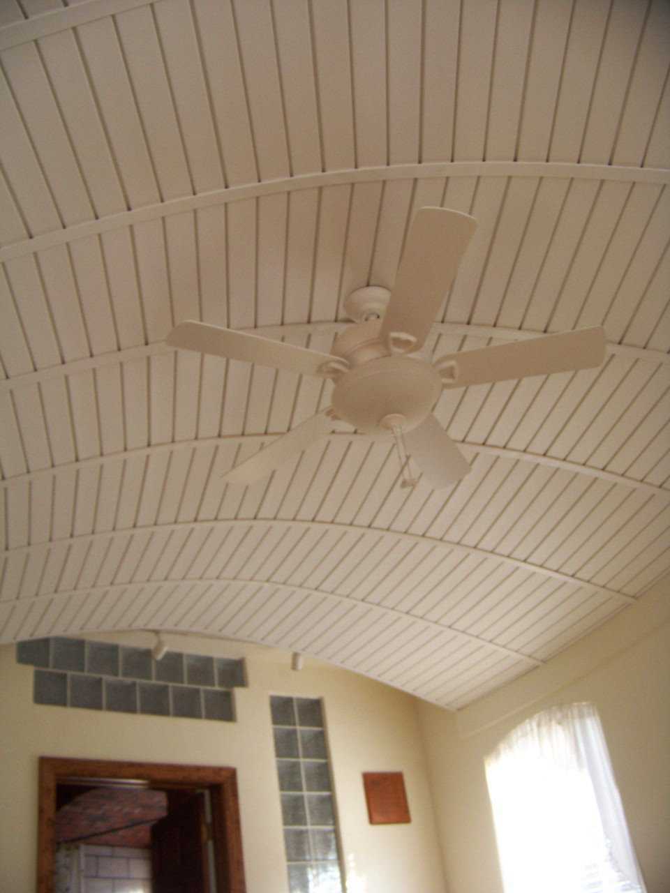 Cool! — The fan contributes comfort while the ceiling it hangs from contributes beauty.