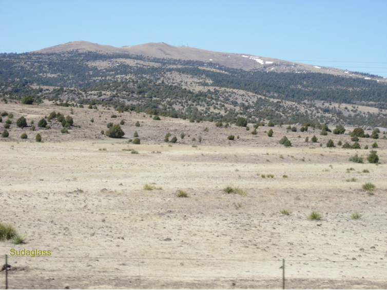 Image 1 — Shield volcano in north-east New Mexico with deep basalt deposits.