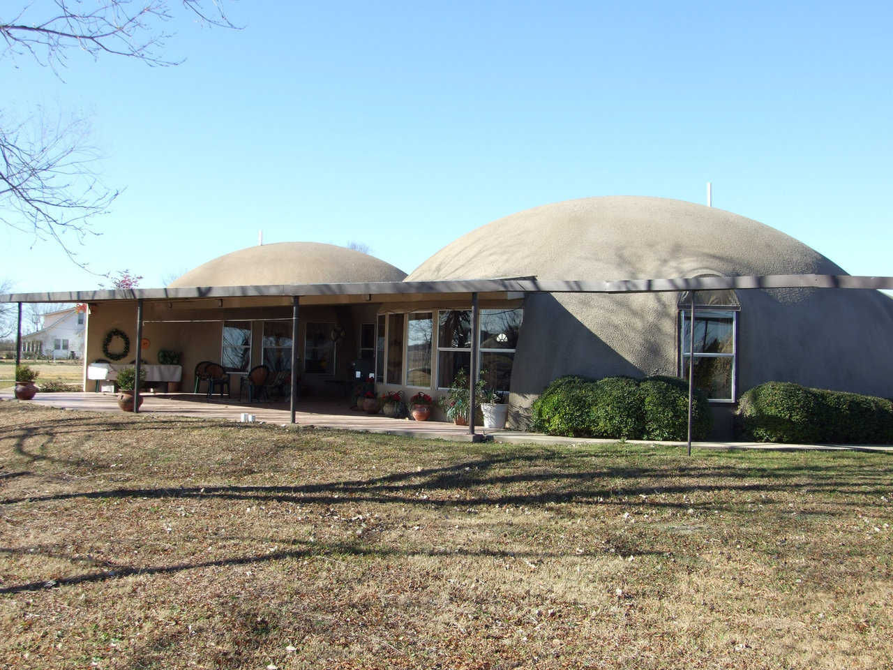 Charca Casa in Italy, Texas — Judy and David South’s home, Charca Casa, was designed and constructed as a duplex of two connected domes, each with a diameter of 40 feet. Since its construction in 1994, Charca Casa has beautifully survived several horrific, typically Texas wind storms and twisters.