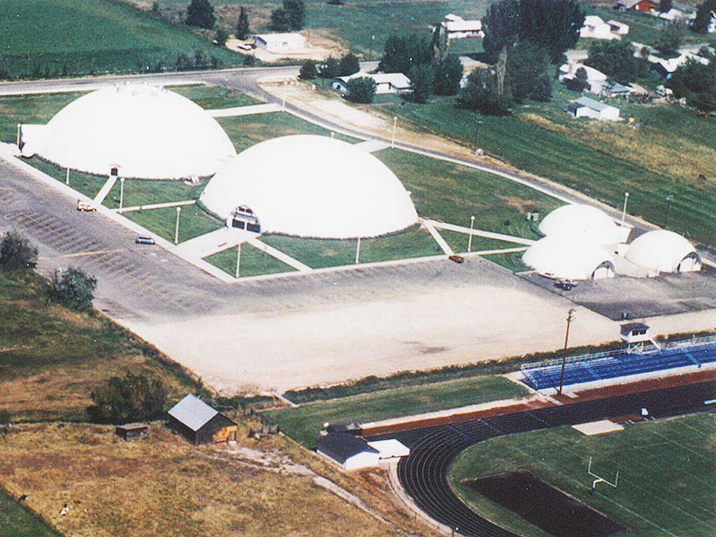 Five Monolithic Domes — Emmett’s 900 students use two 180-foot diameter domes that house classrooms and a gymnasium. The three smaller domes function as woodworking, metal and auto shops.