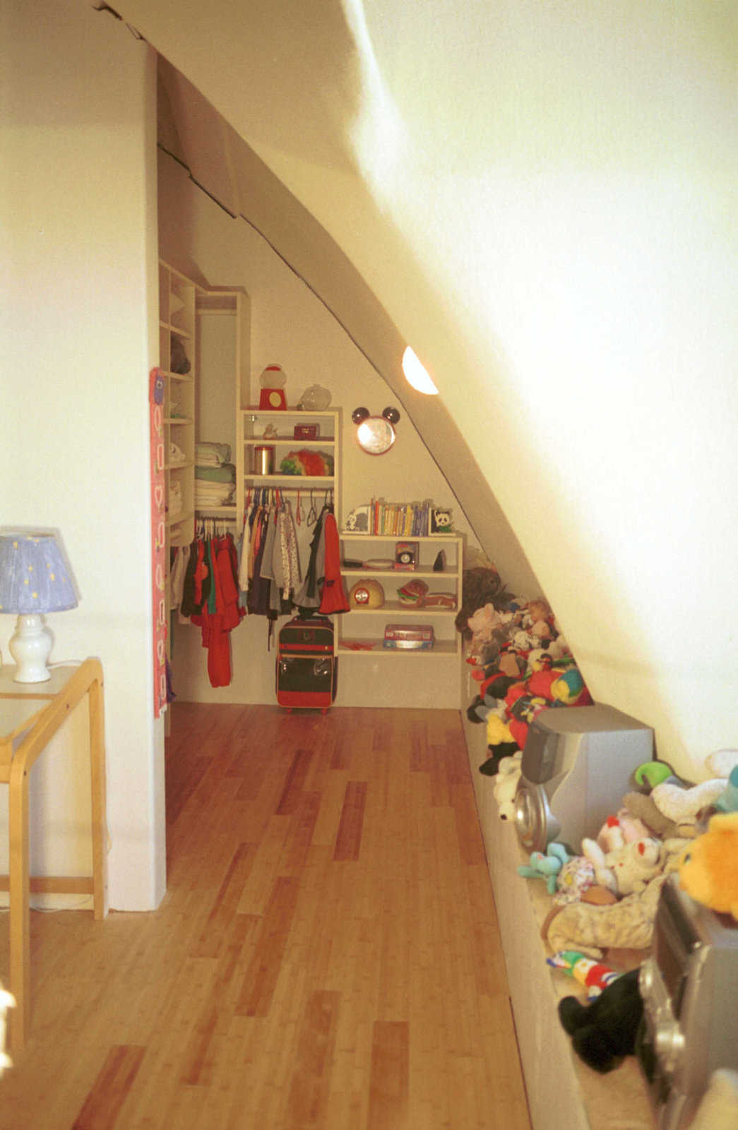 Meili’s stuff — She has ample storage space for clothes, books and toys.