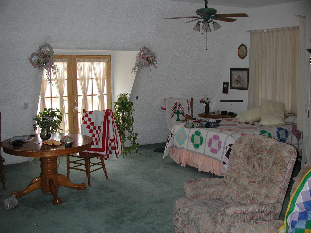 A sweet suite — It includes a sitting area, bedroom, dining area and french doors that lead to a balcony overlooking the atrium.