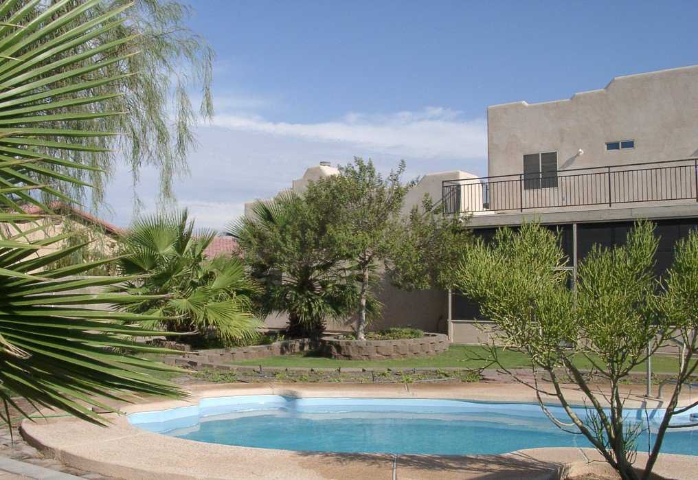 Beat the heat — The folks at Yumadome enjoy their pool.