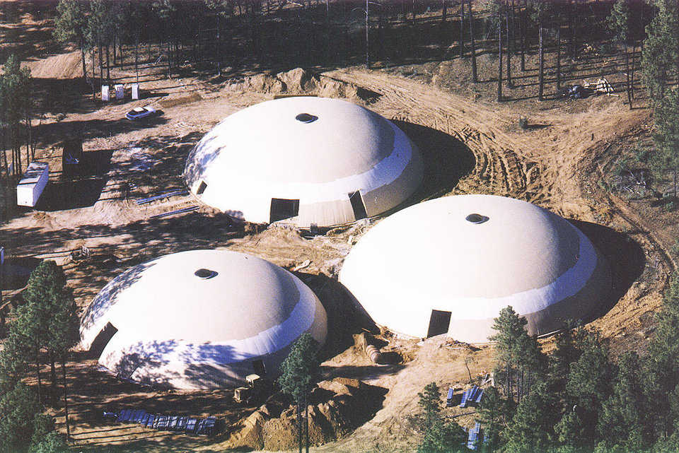 Aerial View — In 1998, the community completed three Monolithic Domes with an interconnecting central corridor.
