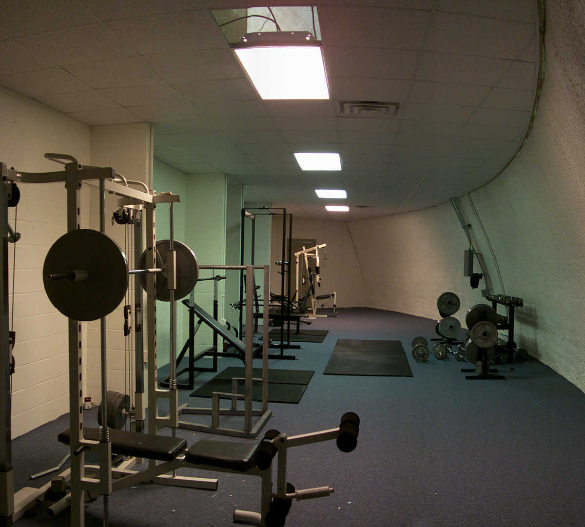 Weight lifting equipment — Well-utilized space behind the gym’s walls houses weight lifting equipment.