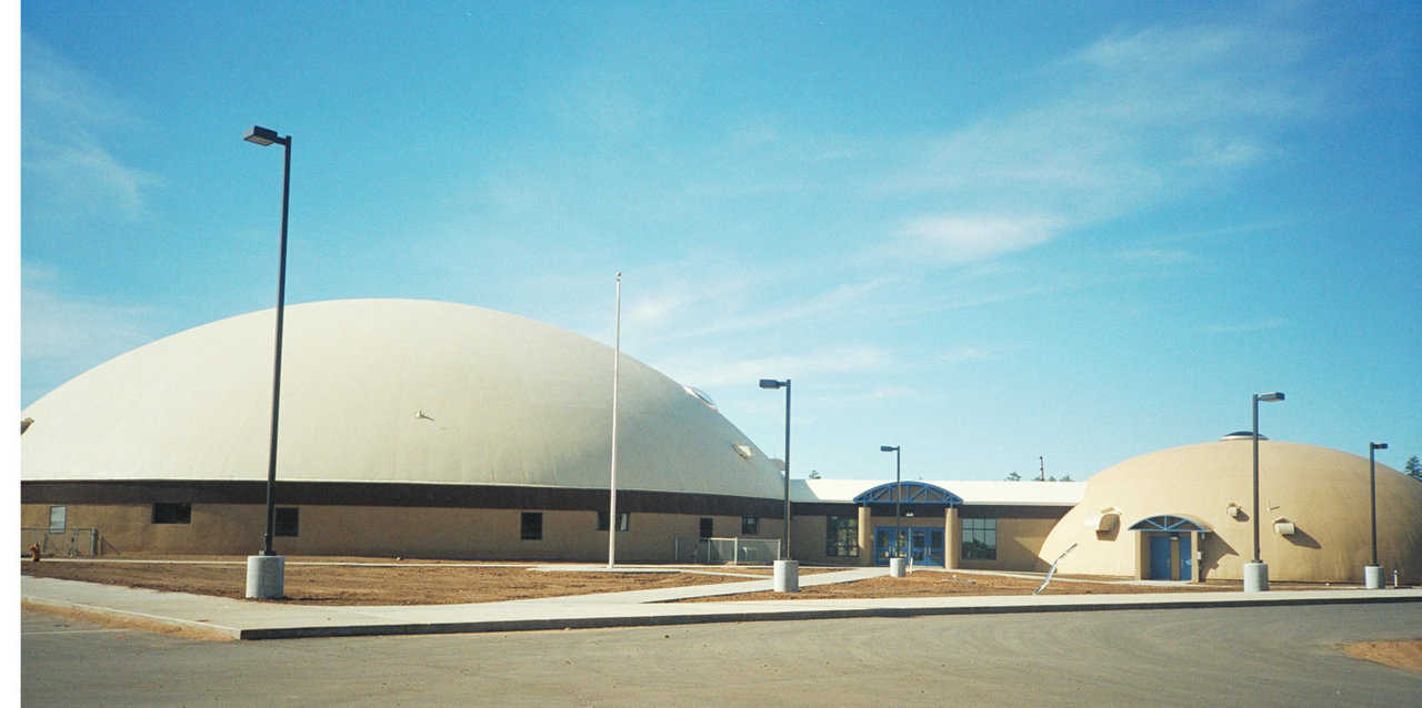 Heber-Overgaard — Their new school campus, opened in January 1999, features two Monolithic Domes, connected by a corridor.
