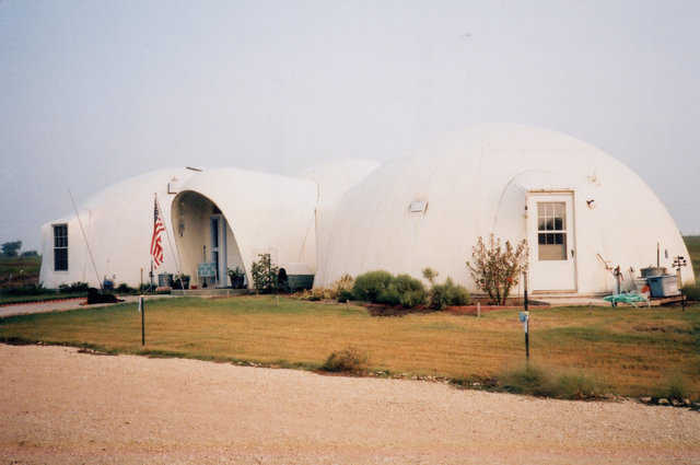A Texan’s Dome Home — It consists of 3, interconnected Monolithic Domes. Central dome is 28’ in diameter and 14’ tall. Two slightly larger domes, each 32′ × 14′, flank the middle dome.
