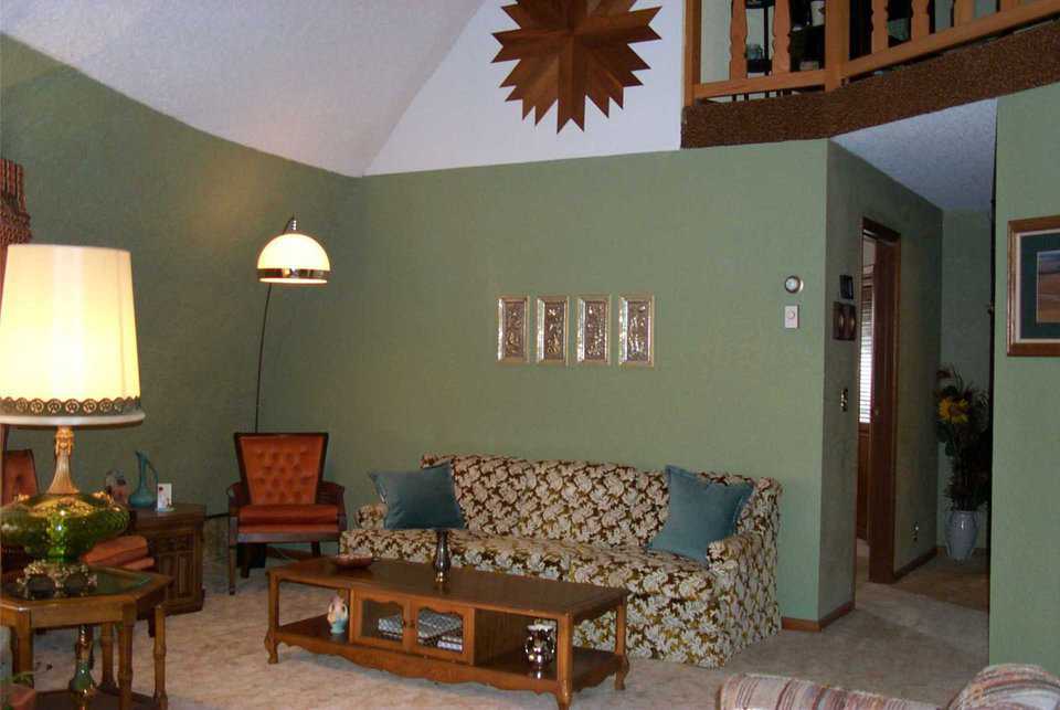 Living room — Painted interior walls provide a visual break to the dome wall.