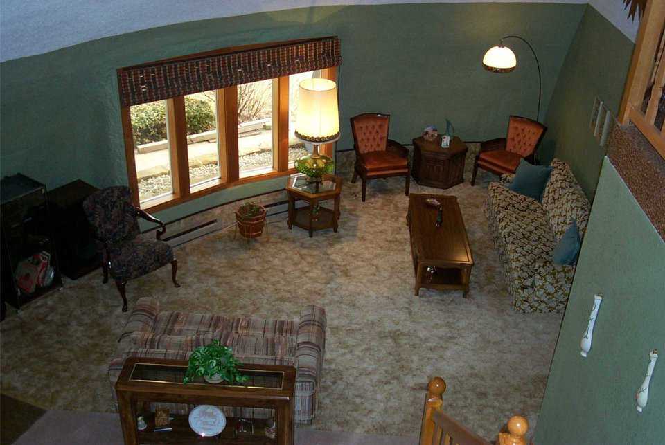 Upstairs view of living room — The living room has comfortable areas for entertaining and just relaxing.