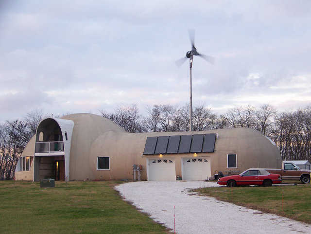 Solar Equipped in Illinois — Kati and Robin Millers’ Monolithic Dome home has 6 solar-thermal collectors that collect the sun’s heat and convert it into thermal energy. It heats water that circulates through the radiant heating system to heat the home.