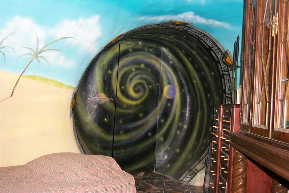 Outer Space — Swirling planets and stars might make you feel like an astronaut in this bedroom.