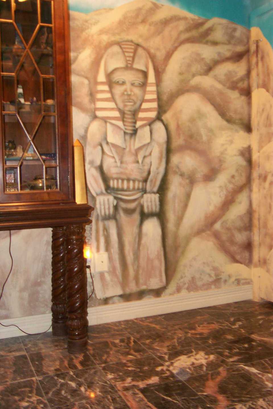 A Permanent Observer — Since he’s painted onto the wall, you might say he neither sees, hears nor does any evil.
