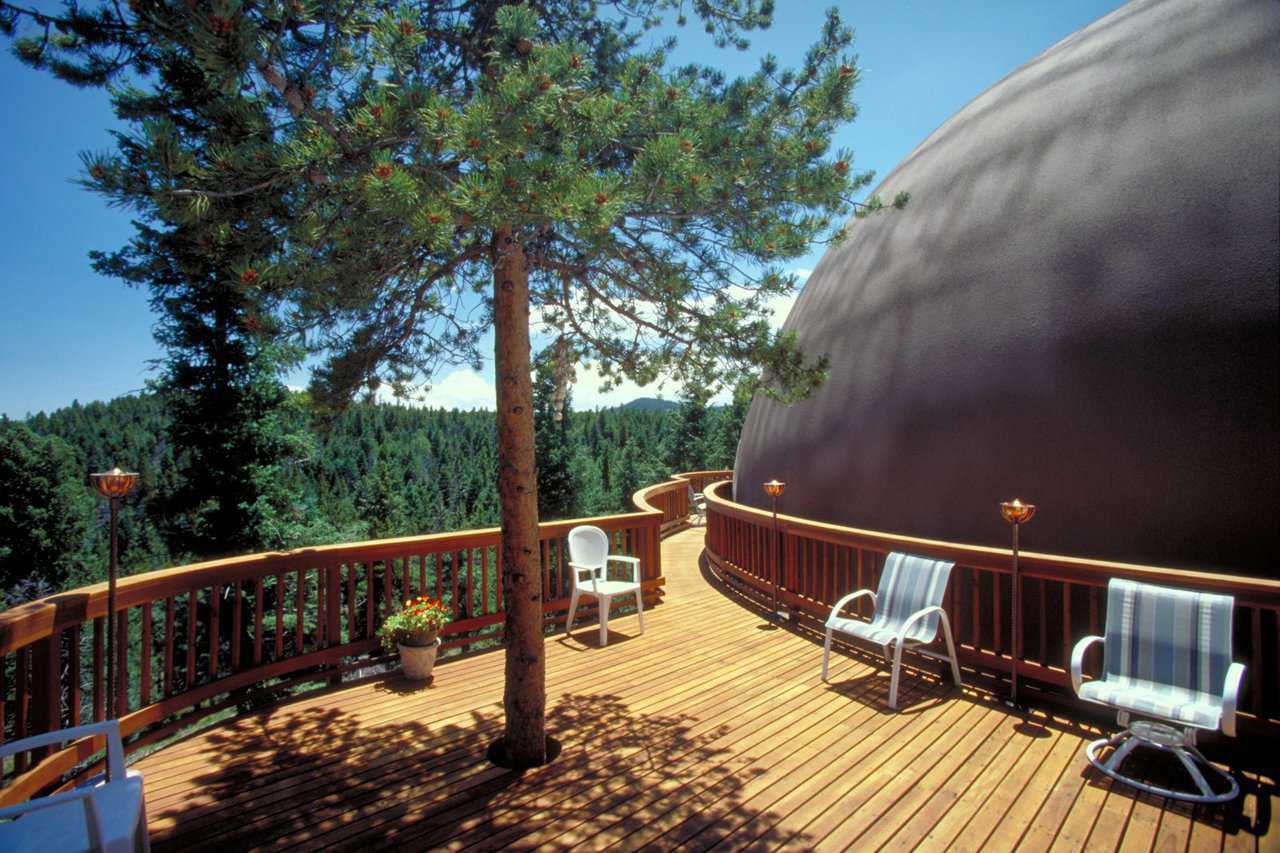 Redwood deck — It has a ponderosa pine growing through it.