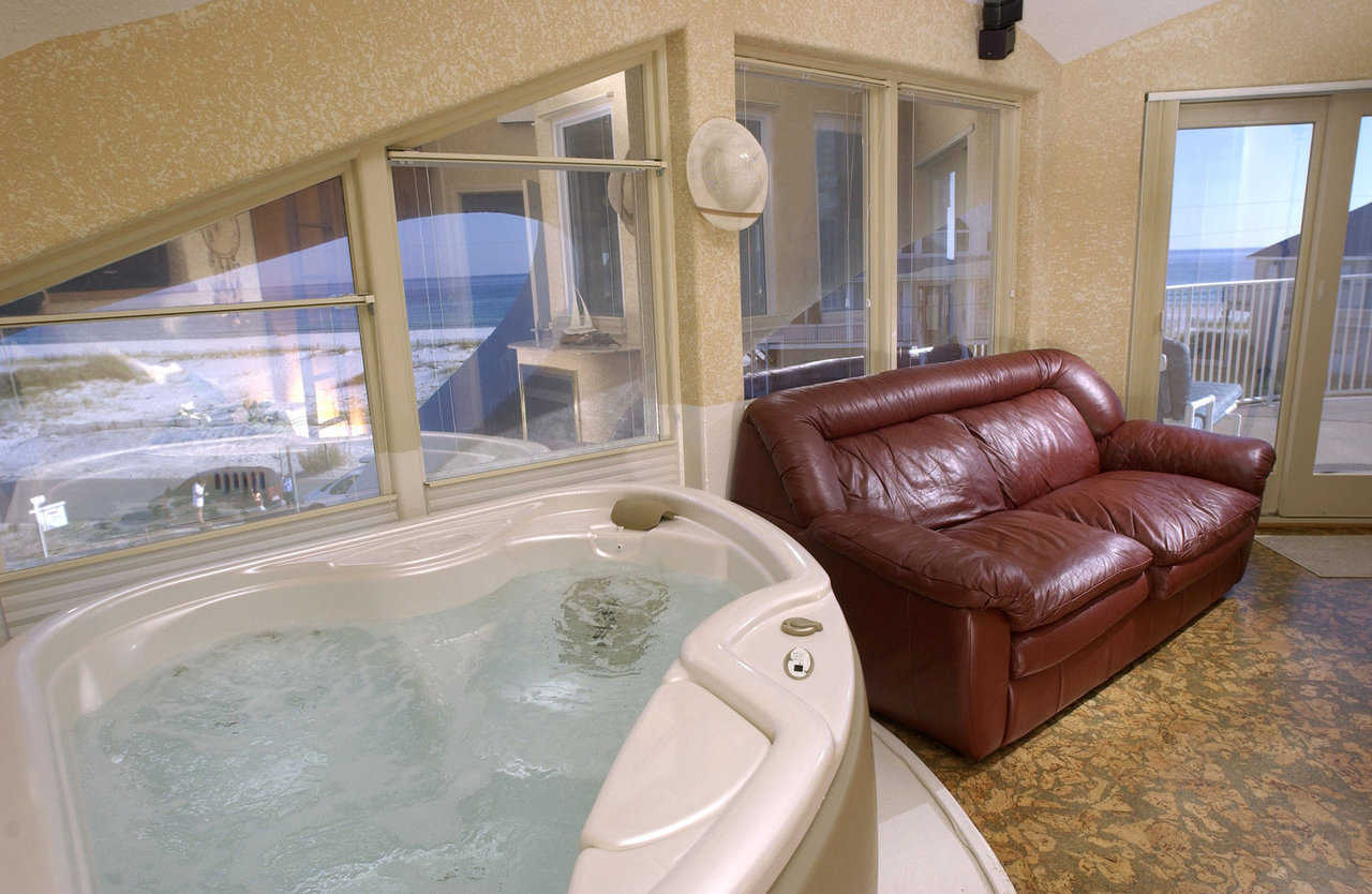 Master bath — You can relax in the generously proportioned whirlpool tub or on a soft leather sofa.