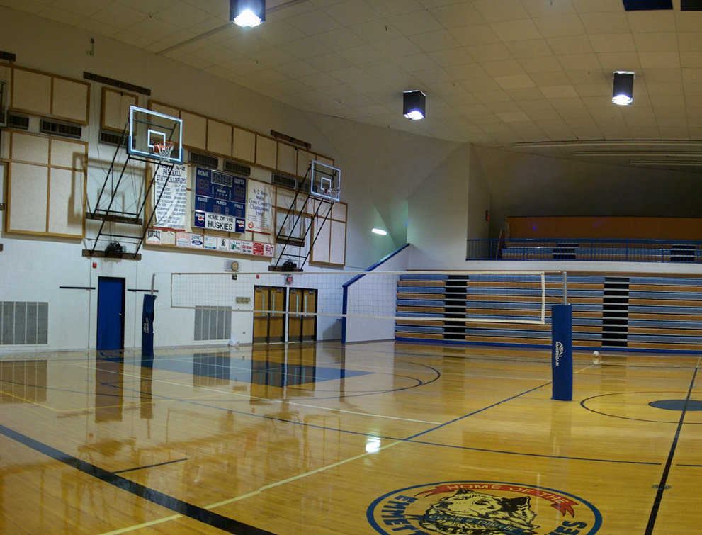 The 180-foot Emmett High School gymnasium in Emmett, Idaho. Its double-wide gym can seat 3,000. It also houses a weight room, a wrestling room, locker rooms, offices, concessions and a small theatre.
