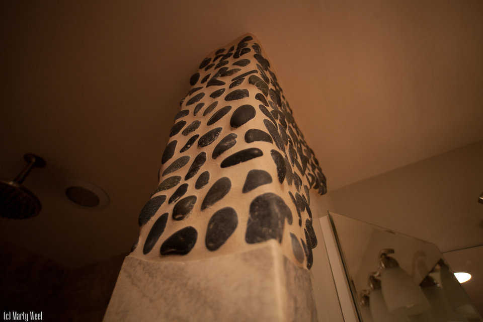 Mexican stones and pebbles embedded into stucco can create attractive designs.  