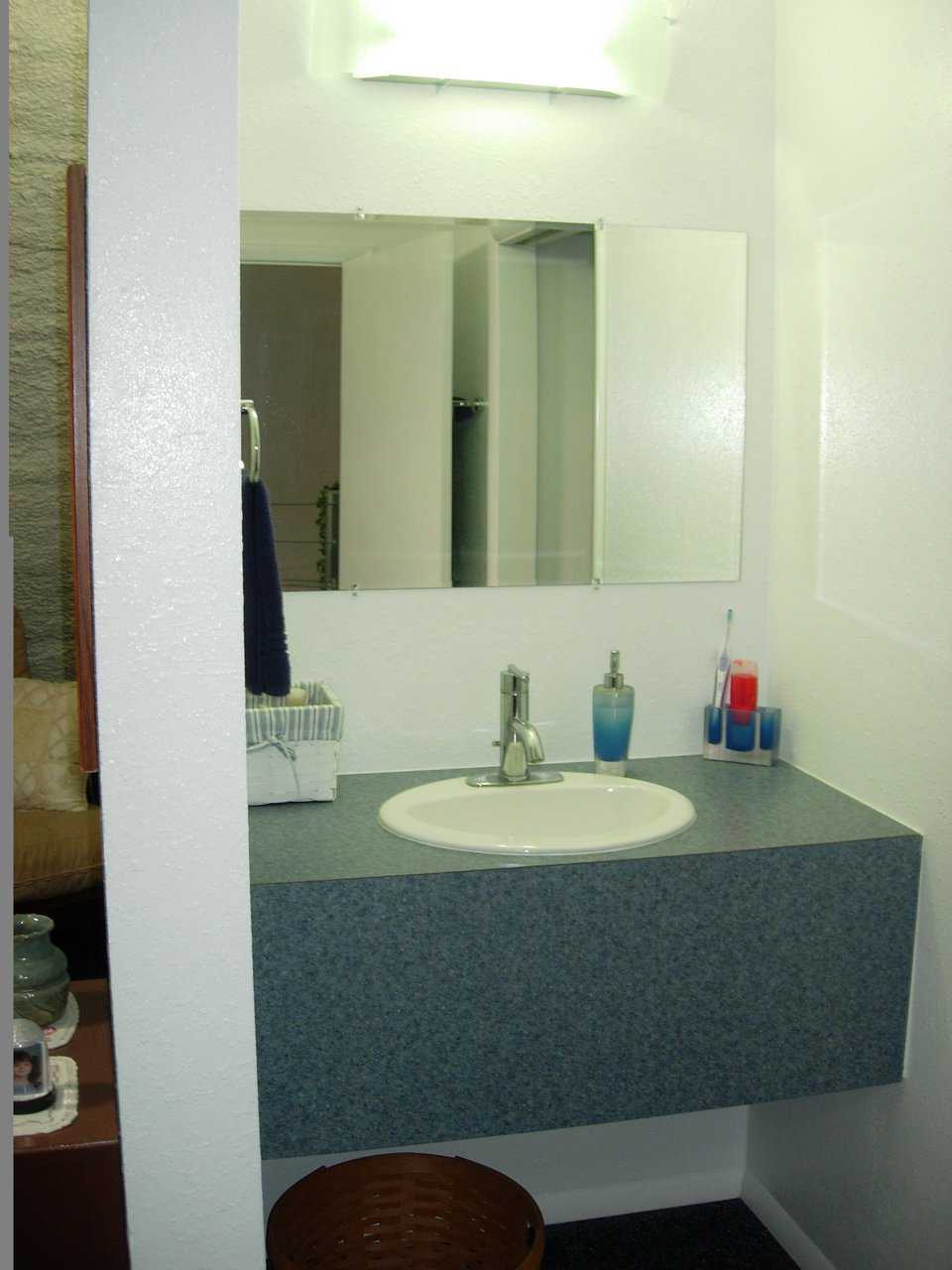 Bathroom is attractive and easily maintained.