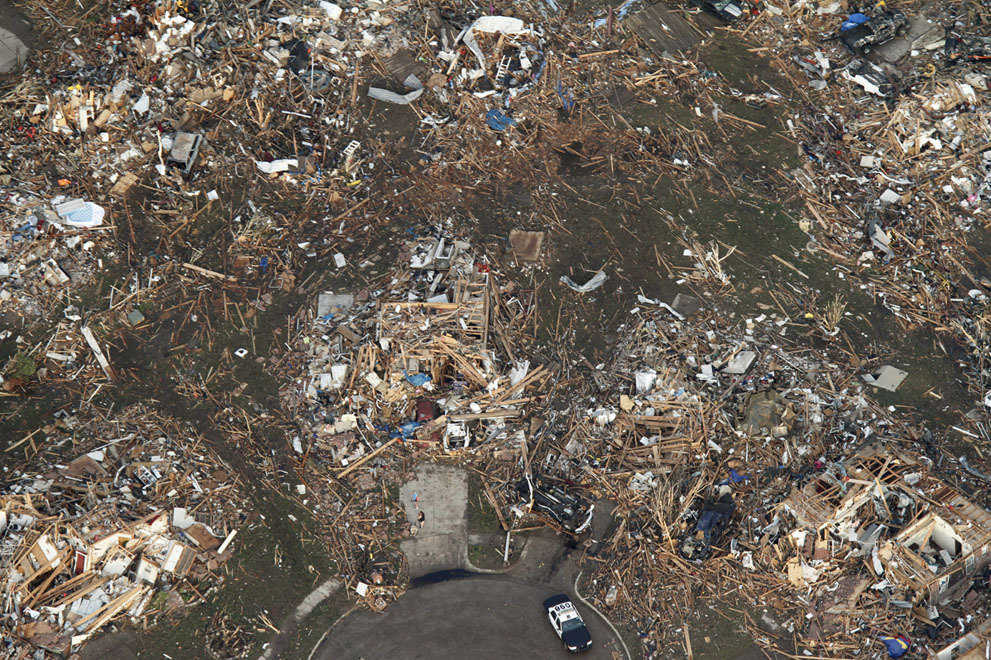This aerial photo shows the remains of homes, after being flattened by a massive tornado in Moore, Oklahoma, on May 20, 2013.