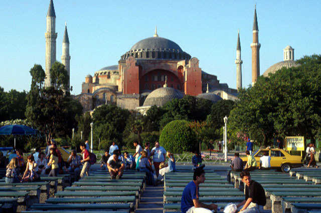 The central dome — The central dome, 102 feet in diameter and 184 feet in height. Arches at the east and west are buttressed by half-domes. Final domes complete in 563.