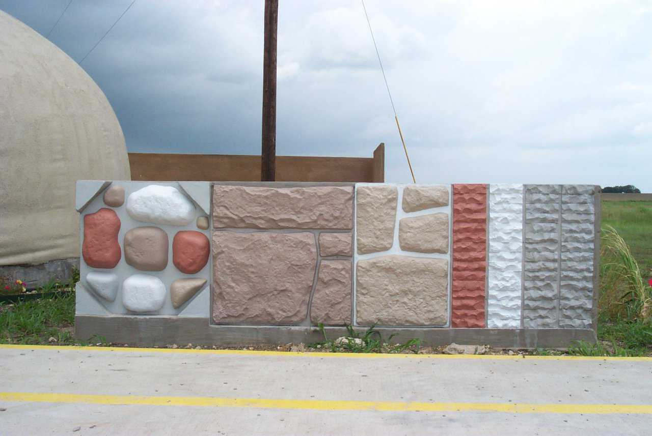 Finish Displays — River rock (left), two types of field stone (center), rock face brick (right). The sprayed-in-place rock was stained. Shown is a pentrating stain. An acid stain or paint could also be applied. These fences are stronger and less expensive to build than a conventional rock fence.