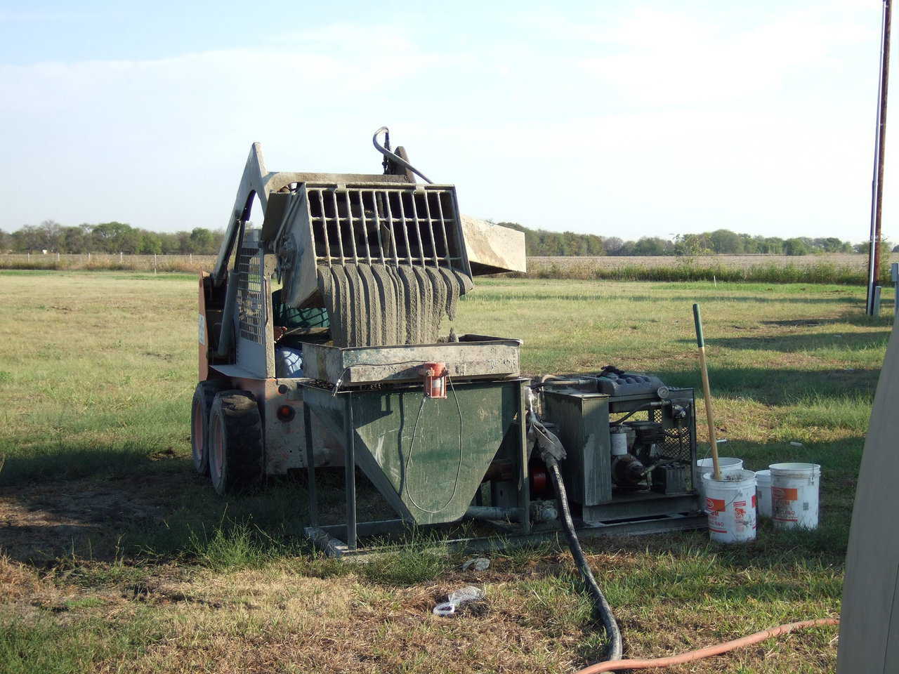 In use — The Vibrating Screen will filter out rocks that are too large for pumping through a shotcrete pump.