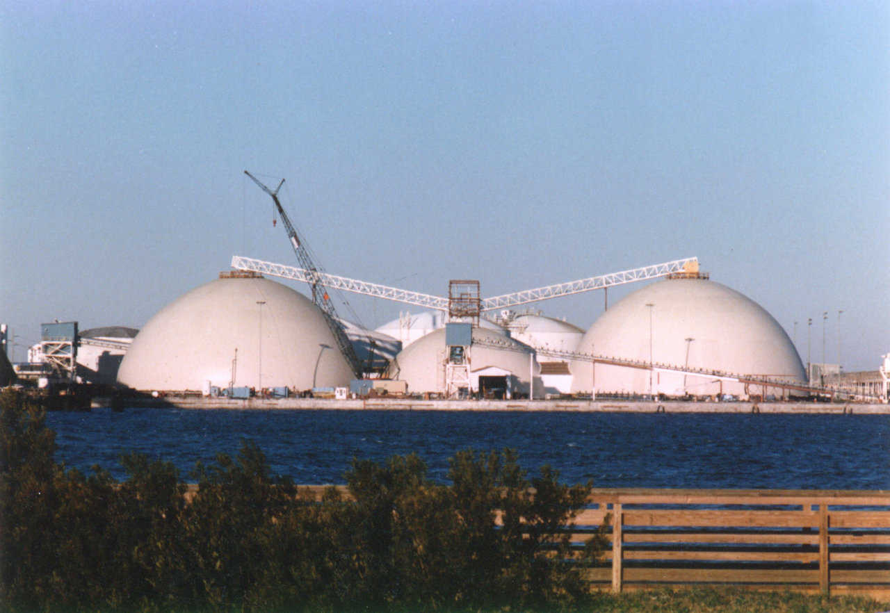 Fertilizer Storages — The PCS Phosphate complex in Morehead City, North Carolina includes two 172′ × 85′ and one 132′ × 51′ domes. In 1996 Hurricane Bertha ravaged Morehead City, but did not succeed in damaging the Monolithic Domes.