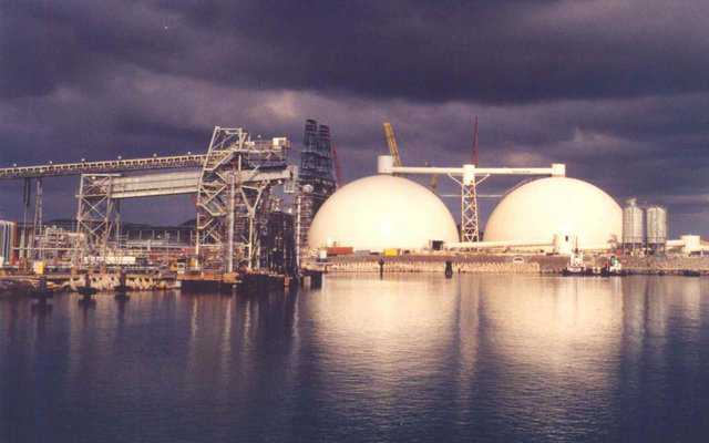 Petroleum Coke Storage — In St. Croix, US Virgin Islands, Hovensa Coker Storage, Bechtel Corp. has two 254′ × 127′ Monolithic Domes. With a capacity of 40,000 metric tons, they’re the world’s largest petroleum coke storages.  After this photo was taken, an equipment tower and conveyor system was set on top of the domes. The weight allowance was one million pounds.