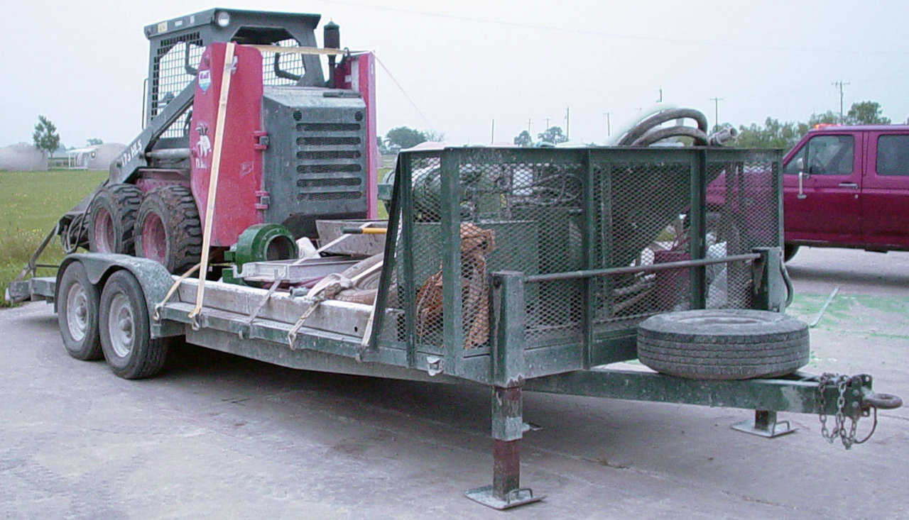 Monolithic’s Heavy Duty Equipment Trailer — Note the “landing” jacks on the front end.