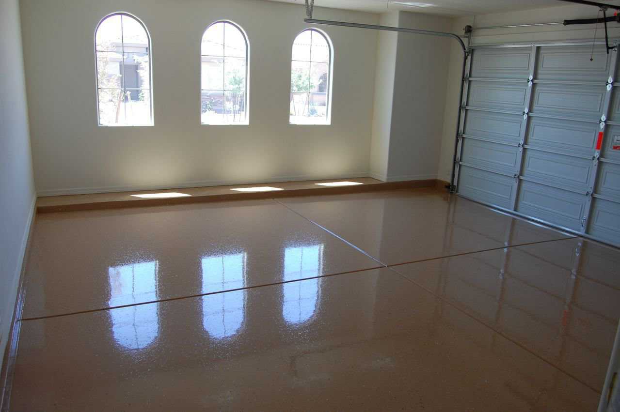 Garage floor — A properly installed epoxy floor can beautify a garage and enhance the value of a house.