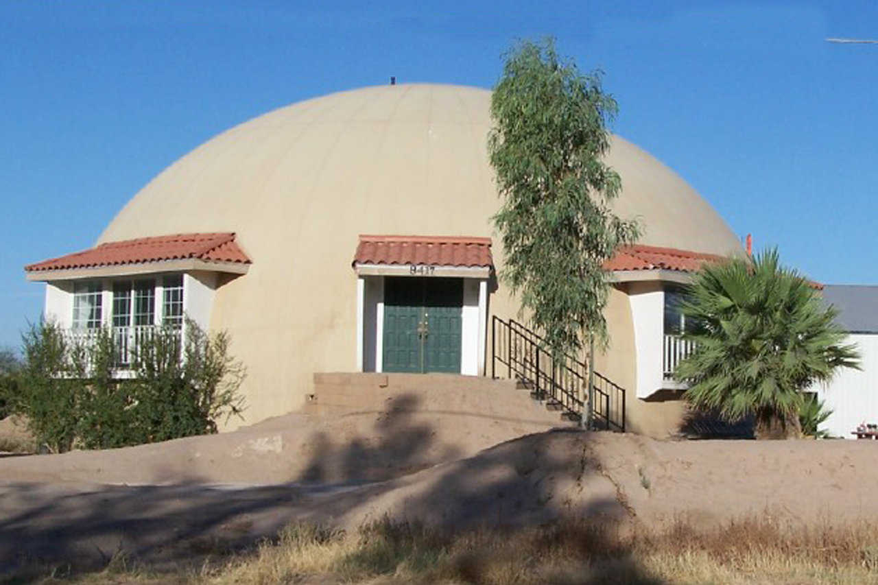 Monolithic Dome Home in Mohave Valley, Arizona — Built on a 10-foot stemwall that goes about 4 feet into the ground, this dome has a diameter of 60 feet, a height of 35 feet and three levels.