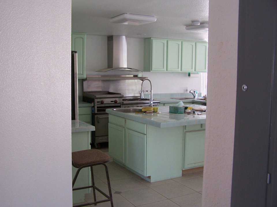 Kitchen — With its tile floor and smooth countertops, the kitchen is a pleasure to work in and easy to keep clean.