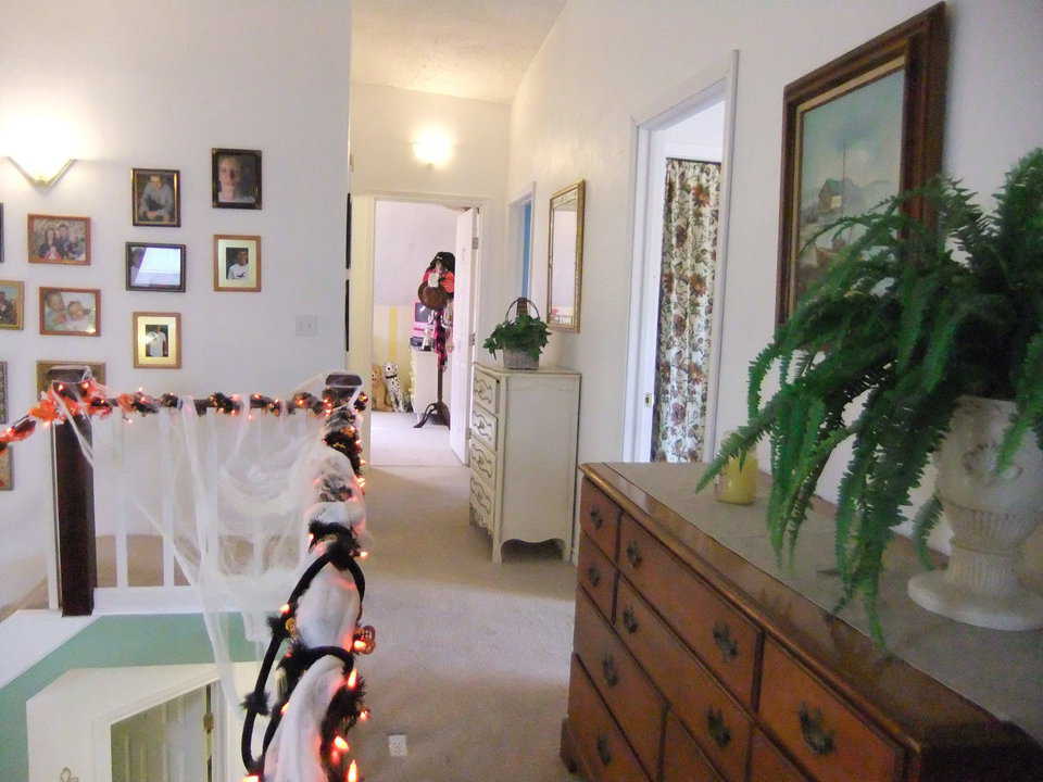 Storage — Dressers and chests fitted against dividing walls provide extra storage.