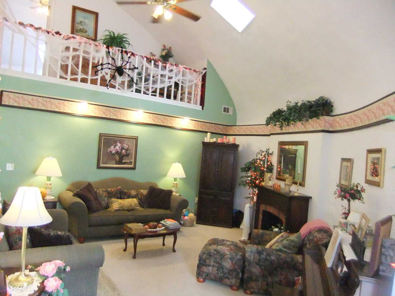 Comfy and Cozy — The artificial fireplace is not a source of heat but of atmosphere. This Orion has a standard, forced-air heating and cooling system.