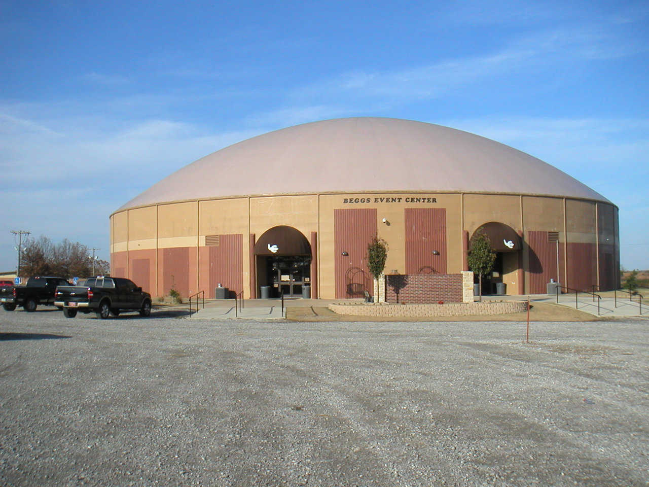 Beggs, OK Event Center — Beggs built two Monolithic Domes: A 160’ diameter gymnasium/event center built on a 24’ Orion wall; a 112’ diameter dome on a 12’ Orion wall that provides nine additional classrooms, offices and a student commons area.