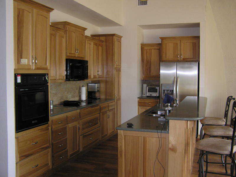 Finished Kitchen — Custom made, hickory cabinets provide beauty as well as storage.