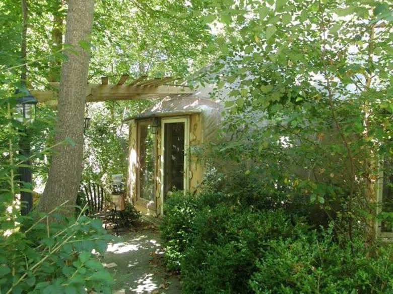 Outdoorsy! — The owner chose a heavily wooded, double lot in Marietta, Georgia for his Monolithic Dome home and kept its design very open.