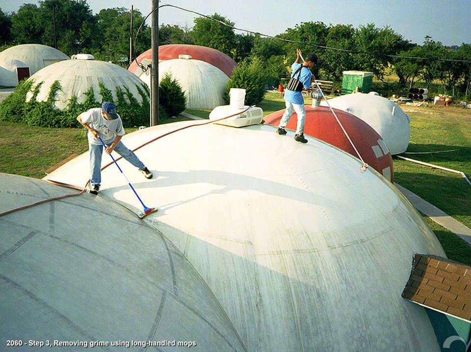 The process — * Use long ladder to get to dome’s top.

	Have someone hold ladder during the climb.
	Wear soft-soled shoes.
	Using long-handled brush or mop and a cleaning agent, scrub Airform’s top.
	Rinse with water hose.
	Standing at ground level, use long-handled brush to scrub Airform’s sides.
	Rinse with water hose.
