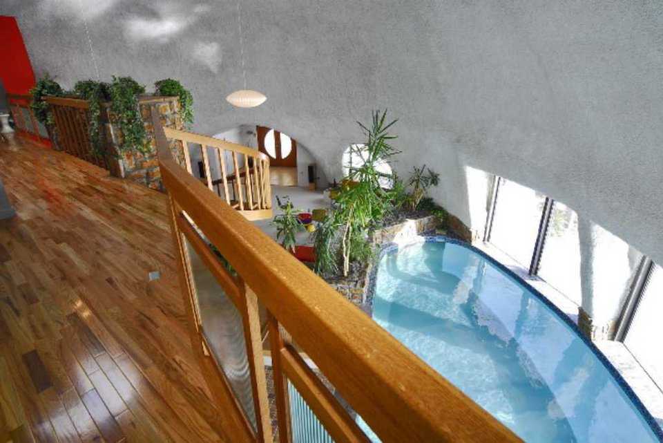 Swimming Pool — The indoor heated pool and hot tub include a state-of-the-art, autopilot, salt water purifying system.