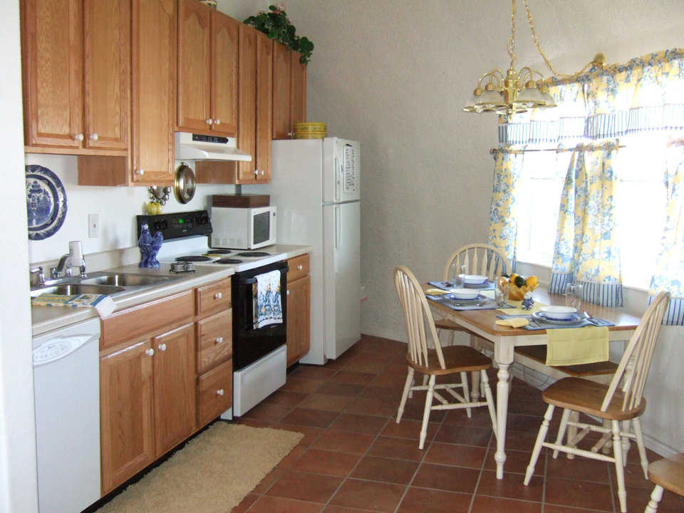 No wasted space — Here is a pleasant kitchen for both cooking and informal dining.